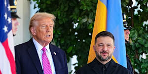 Donald Trump greets Volodymyr Zelensky at the White House.