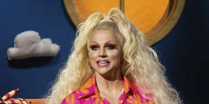Courtney Act appearing on Play School Story Time.
