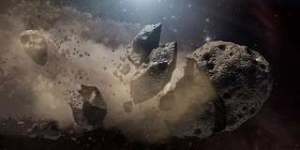 Scientists think that a giant asteroid,which broke up long ago in the main asteroid belt between Mars and Jupiter,eventually made its way to Earth and led to the extinction of the dinosaurs. 