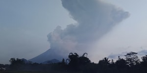 Mount Merapi spews volcanic material into the air in Sleman,Indonesia.