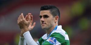 Tom Rogic scored an extra time winner to spur Celtic to Scotland's third domestic glory of the season.