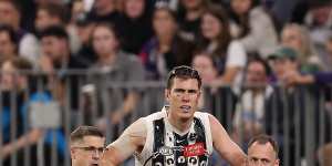 Why Magpie’s return is being delayed;Sydney coach Longmire denies byes benefit