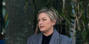 Embattled minister Amanda Camm fronted media to explain cuts to domestic and family violence services on Monday. 