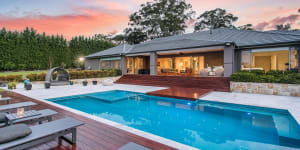 The two-hectare property at Dural owned by the Hales family comes with resort-style facilities including a pool,tennis court and golf range.