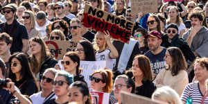 People gather at Federation Square during a rally against women’s violence in April.