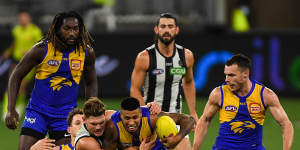 Tim Kelly is caught during the Eagles'loss to Collingwood.