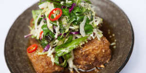 Red Spice Road's signature pork belly dish,with apple slaw,chilli caramel and black vinegar.