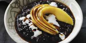 Black sticky rice with mango and coconut cream.