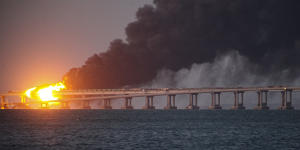 In October 2022,flame and smoke rise from Crimean Bridge connecting Russian mainland and Crimean Peninsula over the Kerch Strait.