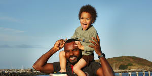 Refugee case worker Dodzi Kpodo,with his three-year-old son Louis,is the Australian Fathering Awards’ Community Father of the Year.