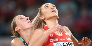 Helen Housby of the Swifts and Emily Mannix of the Vixens only have eyes for the ball on Saturday night.