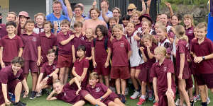 Buranda State School students,teachers,parents,Greens candidate Sally Dillon and South Brisbane MP Jackie Trad celebrate the decision on Thursday.