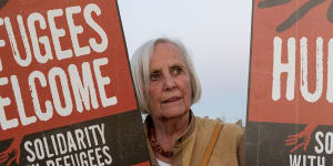 A woman protests against the Rwanda deportation flight at Boscombe Down Air Base in Wiltshire,England this week.