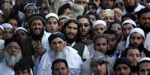 Thousands mourn the cleric known as the'father of the Taliban'