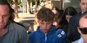 Brodie Dewar leaves court after a previous appearance in December.