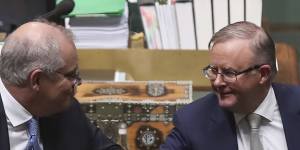Prime Minister Scott Morrison and Opposition Leader Anthony Albanese exchange an elbow bump at the end of the parliamentary year for 2020.