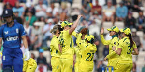 Australia celebrate the wicket of England batter Amy Jones.