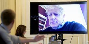 British Prime Minister Boris Johnson chairs a meeting remotely from self isolation after testing positive for coronavirus.