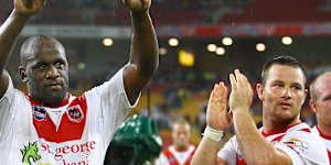 Wendell Sailor pictured with Dragons teammates after a victory in 2009.