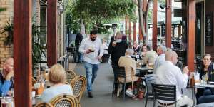 The lunch crowd at Brisbane’s Breakfast Creek Hotel in August. From December 17 at the latest,such venues will be able to operate without density restrictions if all patrons and staff are vaccinated.