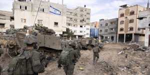 Israeli soldiers take part in a ground operation in Gaza City’s Shijaiyah neighbourhood.