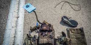The gear of a Palestinian fighter on a road in the aftermath of a deadly attack on a police station in the Israeli city of Sderot on October 8.