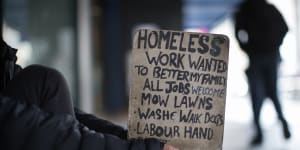 Rachel,37,begging in Elizabeth Street,Melbourne,is one of thousands of homeless females.