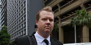 Senior Constable Kristian White arrives at the NSW Supreme Court in Sydney for a detention application by prosecutors after he was found guilty of the Taser manslaughter of 95-year-old Clare Nowland.