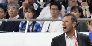 Tony Popovic in the dugout at Saitama Stadium on Tuesday night.