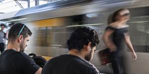 Trains at Redfern Station … they will run as normal this weekend after the government and unions reached a deal.