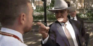 Bob Katter confronts a journalist in Brisbane.