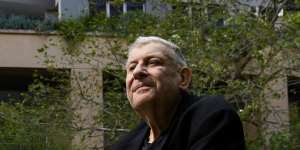 James McKinnon outside his North Sydney apartment.