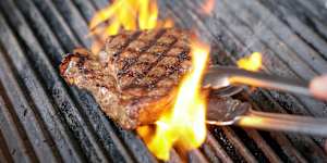Grill the steak for two minutes each side for a flaming good result.