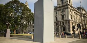 A protective barrier around the statue of Winston Churchill in Parliament Square. 