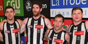 Scott Pendlebury,Tyson Goldsack,Jarryd Blair and Taylor Adams of the Magpies sing in the rooms after their win against the Hawthorn Hawks on May 20.