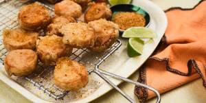 Little sweet potato fritters with chicken salt,lime and sour cream.