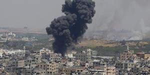 Smoke rises after an Israeli air strike in Gaza on Tuesday.
