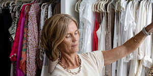 Jo Carmichael,a professional organiser,working in a Sydney client’s closet.