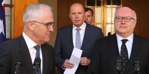 George Brandis with Peter Dutton,centre,and Malcolm Turnbull announcing the new Home Affairs ministry in July.