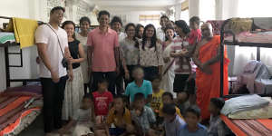 Dr Chamari Jayawardena (second from left) at the orphanage in Sri Lanka