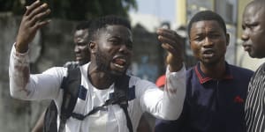 Fires burn in Lagos after soldiers shoot anti-police protesters