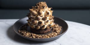 Bombe Alaska with salted macadamia parfait and a chocolate brownie base.