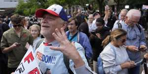 A supporter of Donald Trump reacts to the guilty verdict announced against the former president outside Manhattan Criminal Court.
