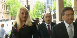 Nicola Gobbo (left) with Tony Mokbel outside court in 2004. She and Con Heliotis,QC (right),were representing the crime boss at the time.