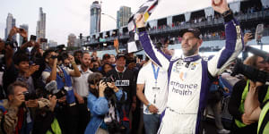 Shane van Gisbergen celebrates his NASCAR victory.