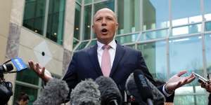 Peter Dutton addresses the media at Parliament House on August 21.