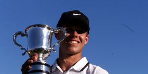Aaron Baddeley holding the Stonehaven Cup after winning the Australian Open in 1999.