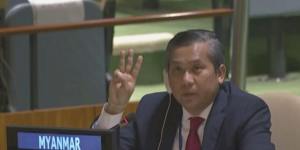 Myanmar Ambassador to the United Nations Kyaw Moe Tun flashes the three-fingered,a gesture of defiance used by protesters in Myanmar,at the end of his speech to the UN General Assembly on Friday.