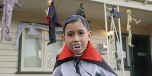Liam Kelly dressed for Halloween. His dad,Damien,first saw trick or treating in the 1982 movie E.T.