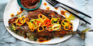 Chermoulas and lime-cured peppers give a kick to this grilled oily fish.